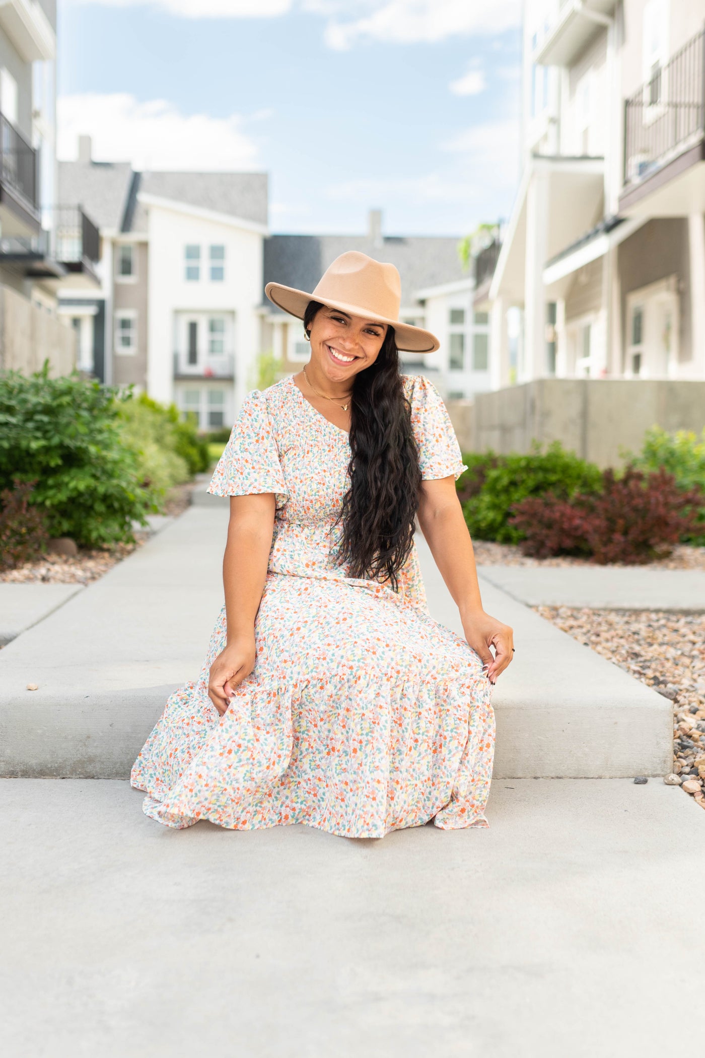 Coral floral dress with smocked bodice
