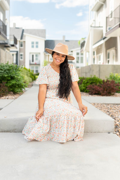 Coral floral dress with smocked bodice