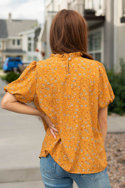 Back view of a mustard top