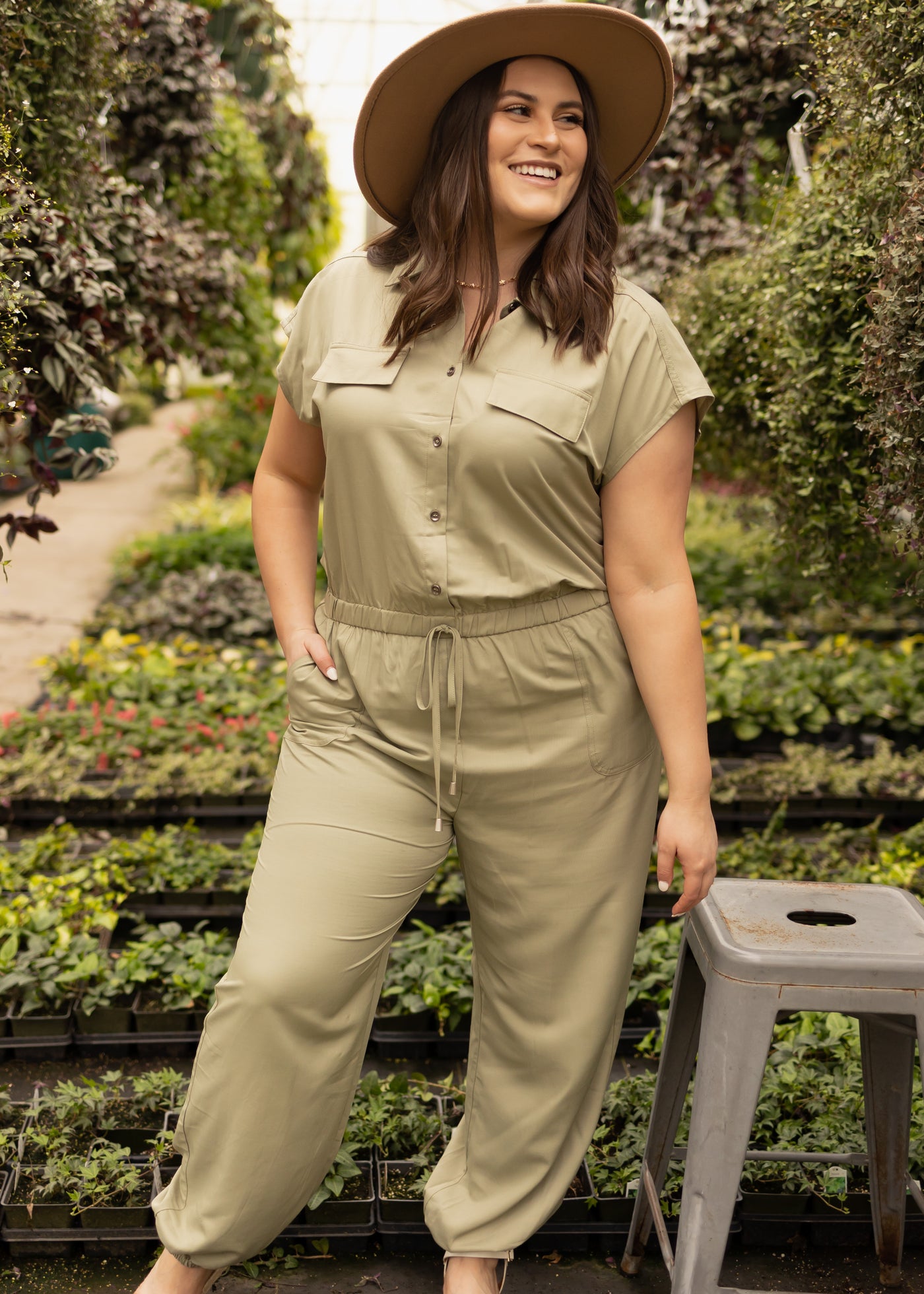 Plus size light olive jumpsuit with buttons on the bodice