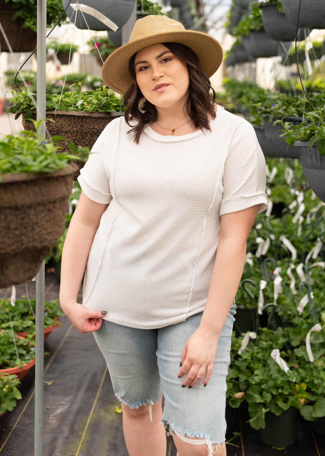 Front view of the white ribbed knit top