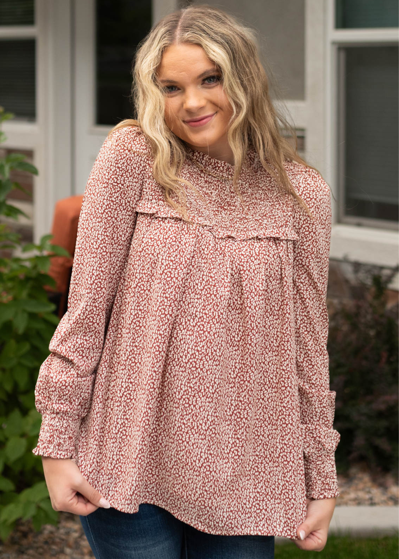 Brick cream print top with ruffle across the front