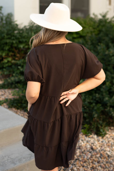 Back view of a deep brown dress