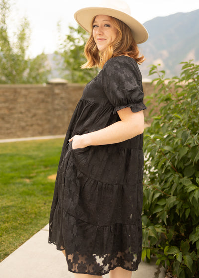 Side view of a medium black dress