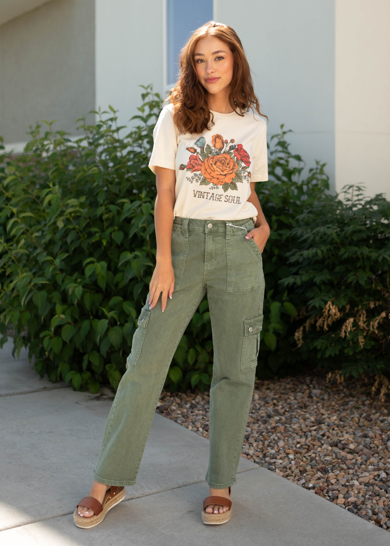 Army green jeans with side pockets