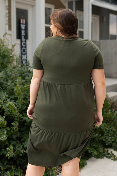 Back view of a plus size olive dress