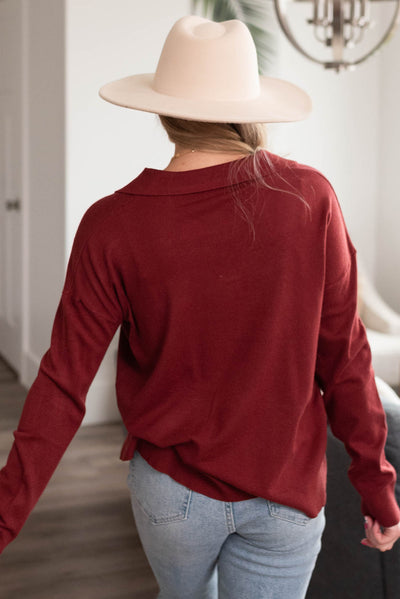 Back view of the long sleeve burgundy top