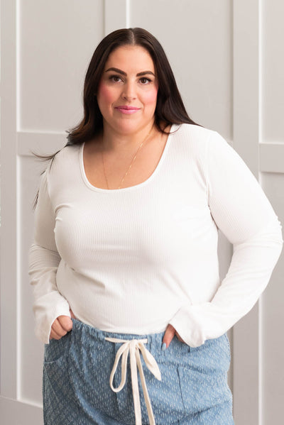 Plus size ivory ribbed long sleeve top with a wide neck