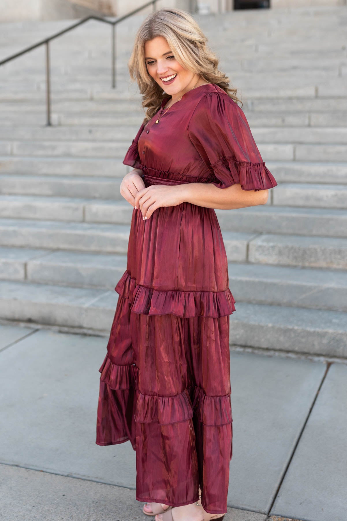 Side view of the burgundy ruffle dress