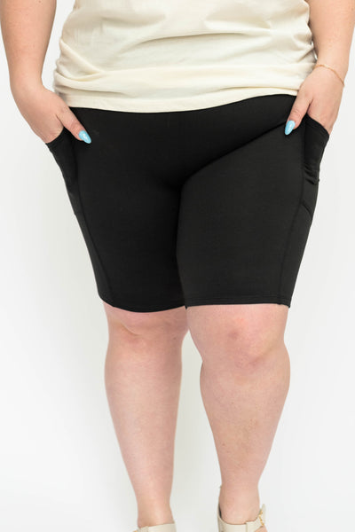 Front view of a plus size black biker shorts.