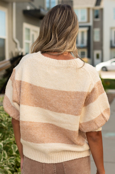Back view of a stripe latte sweater top