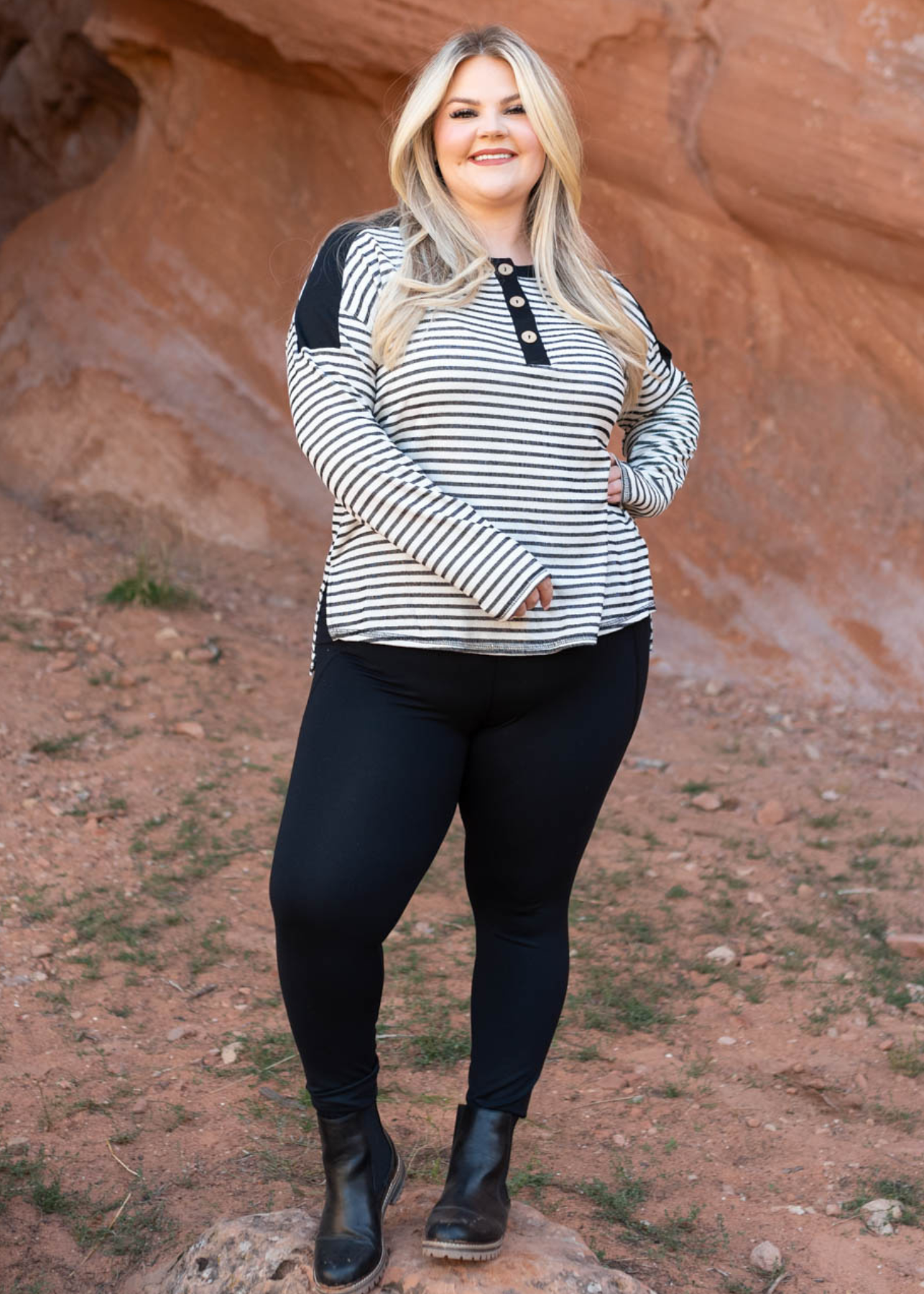 Plus size black striped top with black on the shoulder