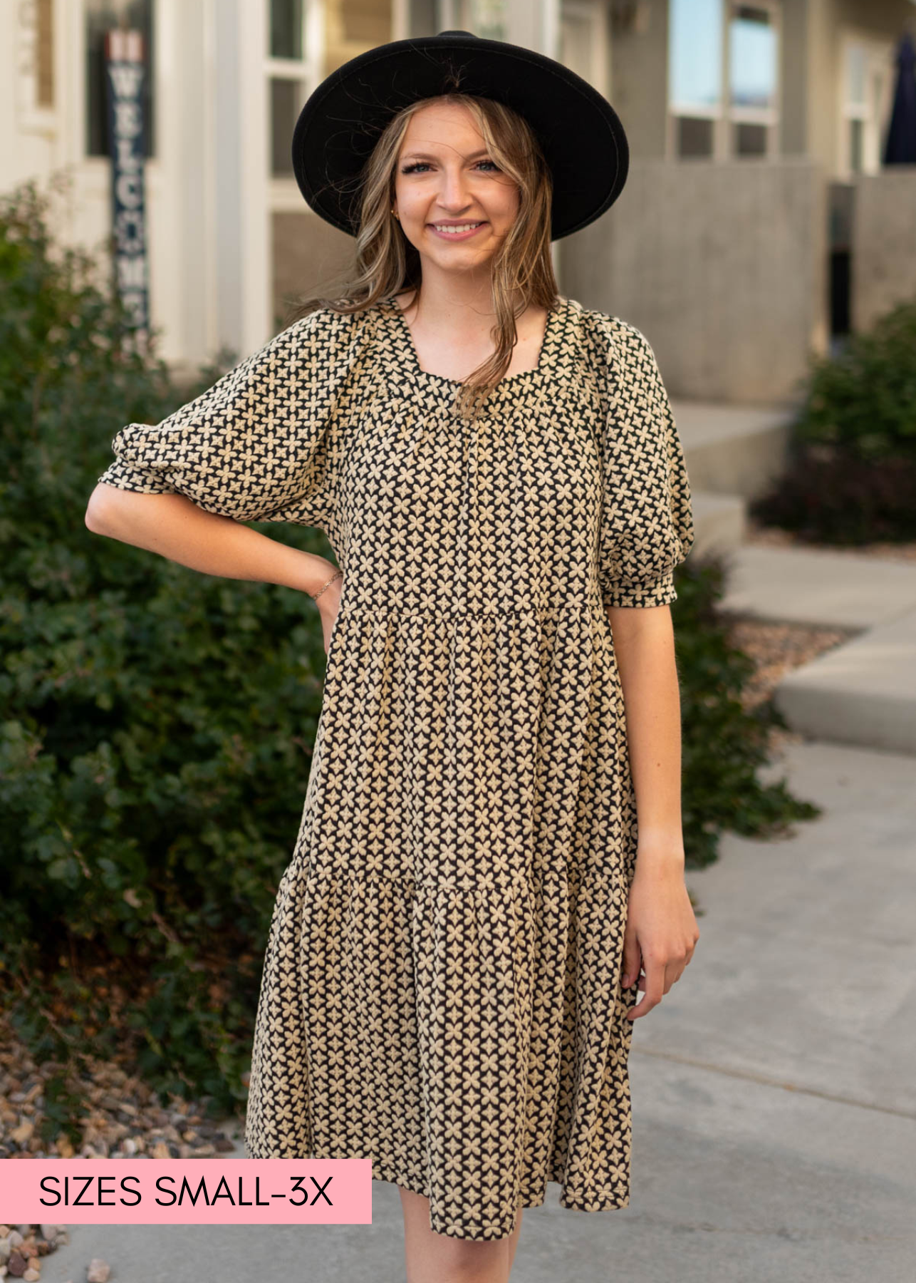 Black pattern tiered dress with a square neck