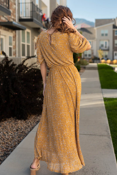 Back view of the Kyra mustard dress