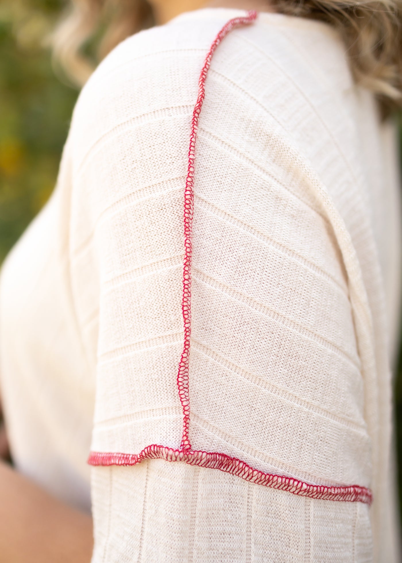 Sleeve of a short sleeve cream top