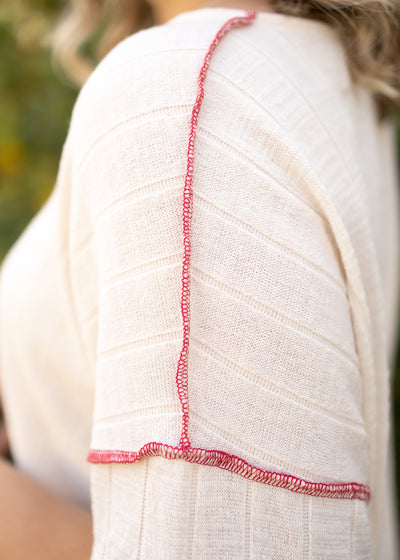 Sleeve of a short sleeve cream top