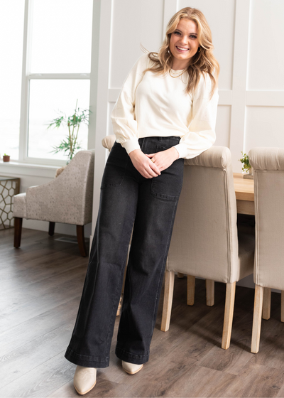 Front view of the ivory puff sleeve sweater