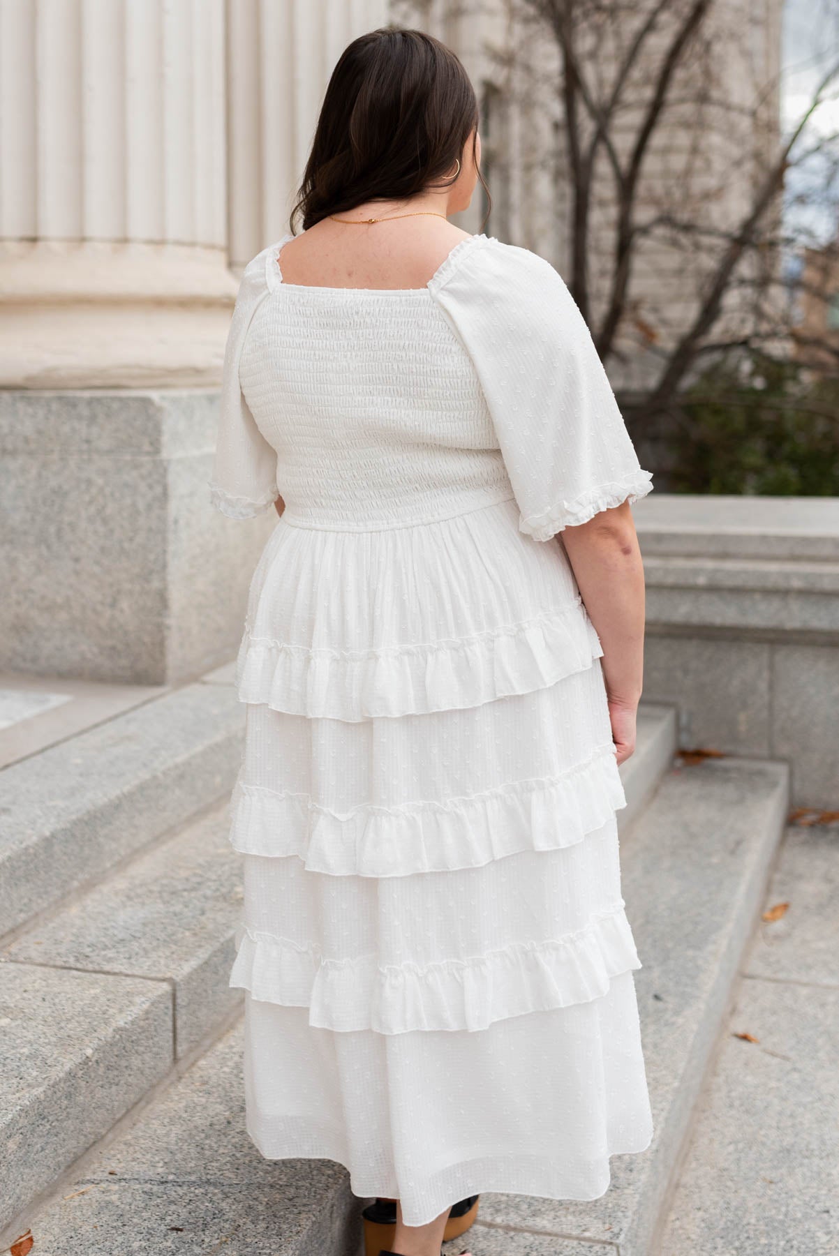 Back view of the white tiered textured dress