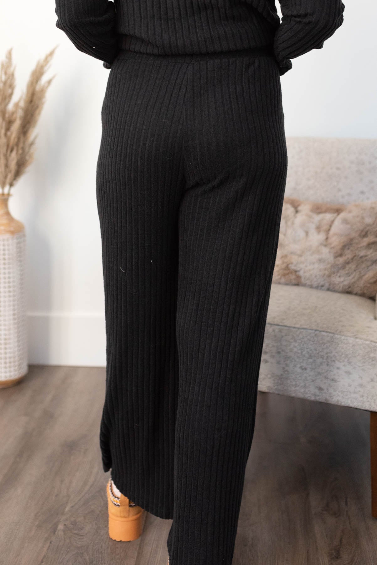 Back view of the pants on the black ribbed lounge set