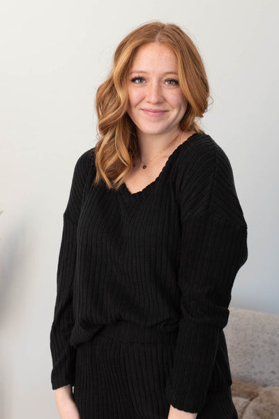 Long sleeve v-neck top on the black ribbed lounge set