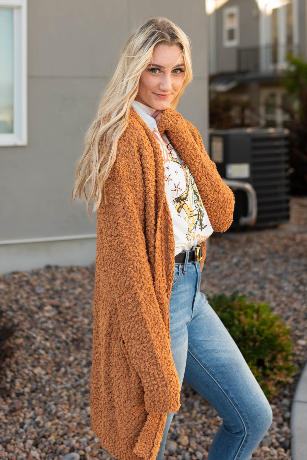 Long sleeve dark mustard popcorn cardigan with a drop sleeve