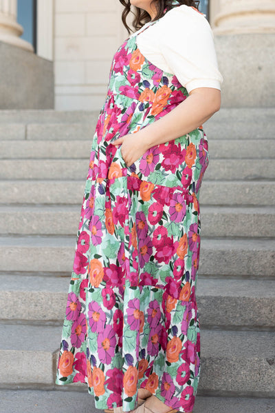 Side view of the multi floral tie dress with pockets