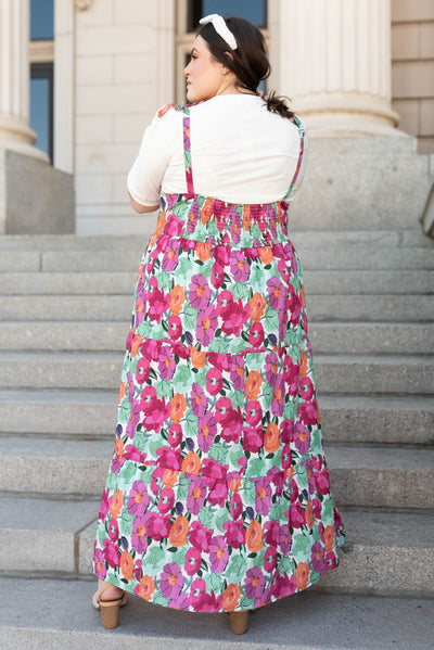 Back view of the plus size multi floral tie dress