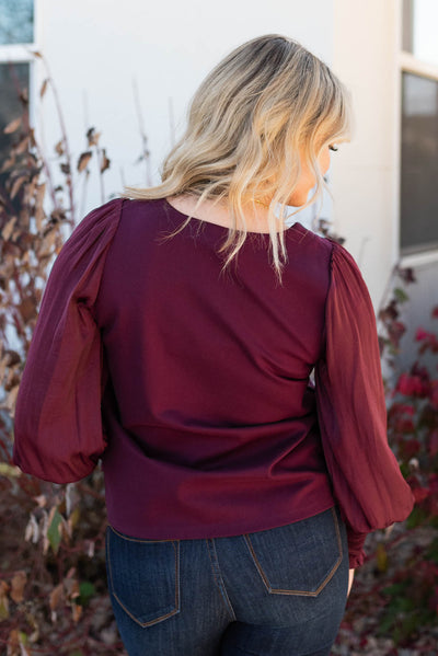 Back view of the wine satin sleeve blouse