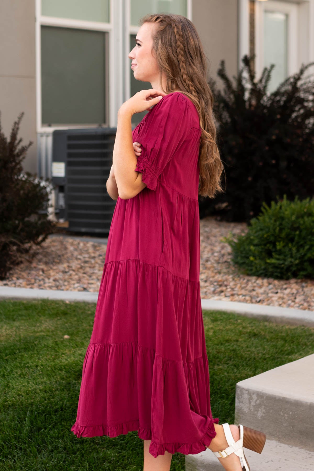 Side view of a ruby red dress