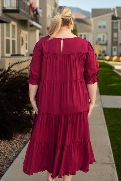 Back view of a plus size ruby red dress