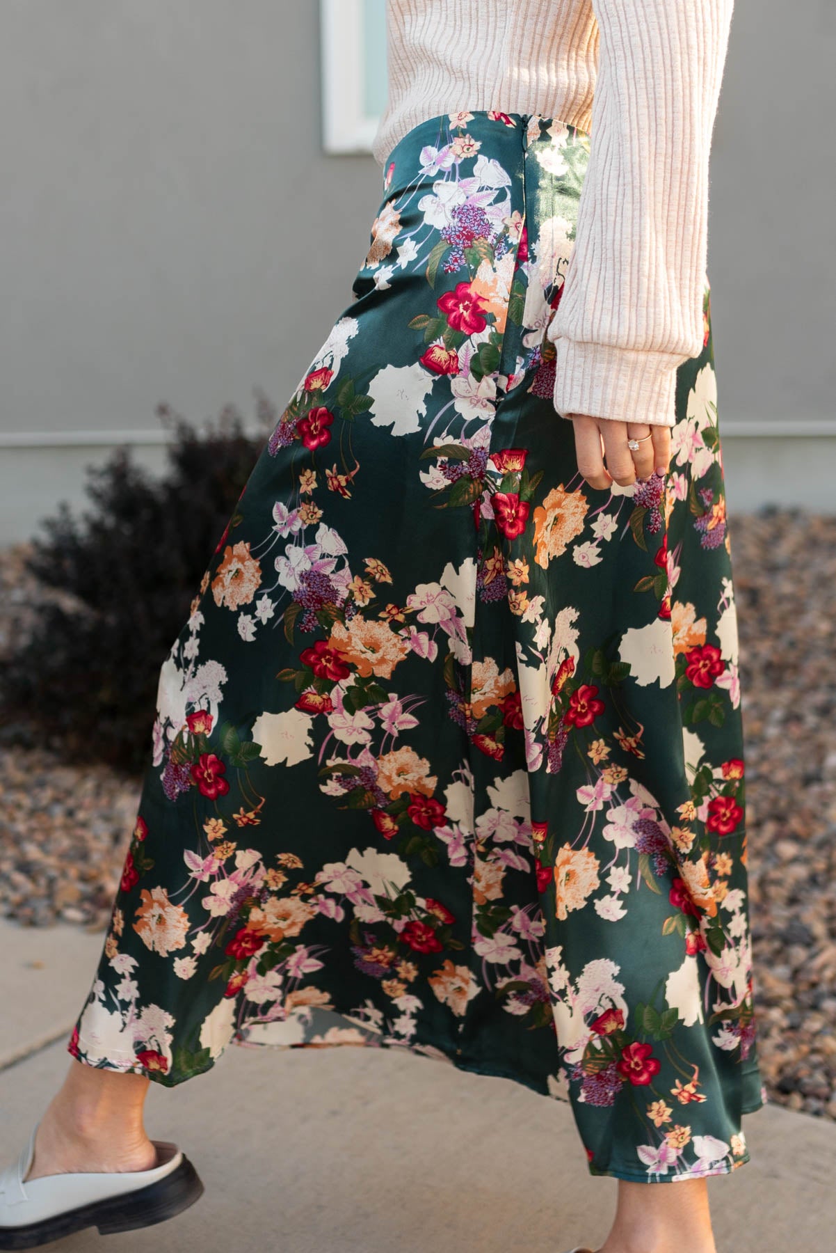 Side view of a satin floral skirt