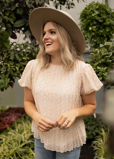 Short sleeve ivory floral top with pleated sheer fabric
