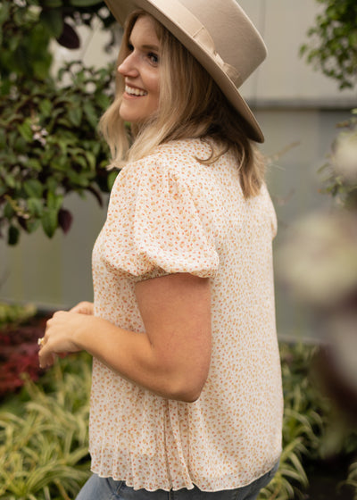 Sheer ivory floral pleated top