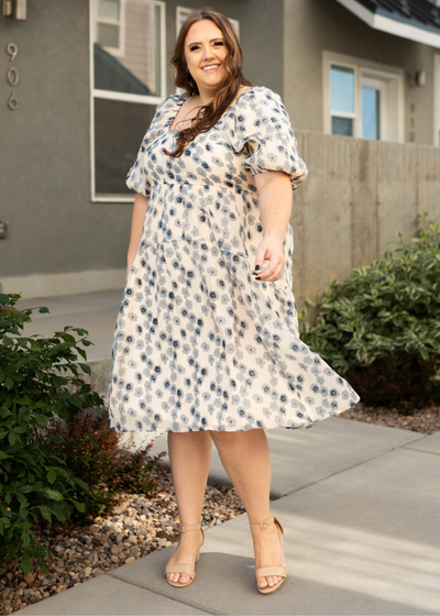 Plus size blue dress with short sleeves and floral print