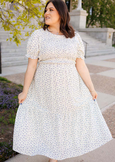 Short sleeve blue floral smocked dress in plus size