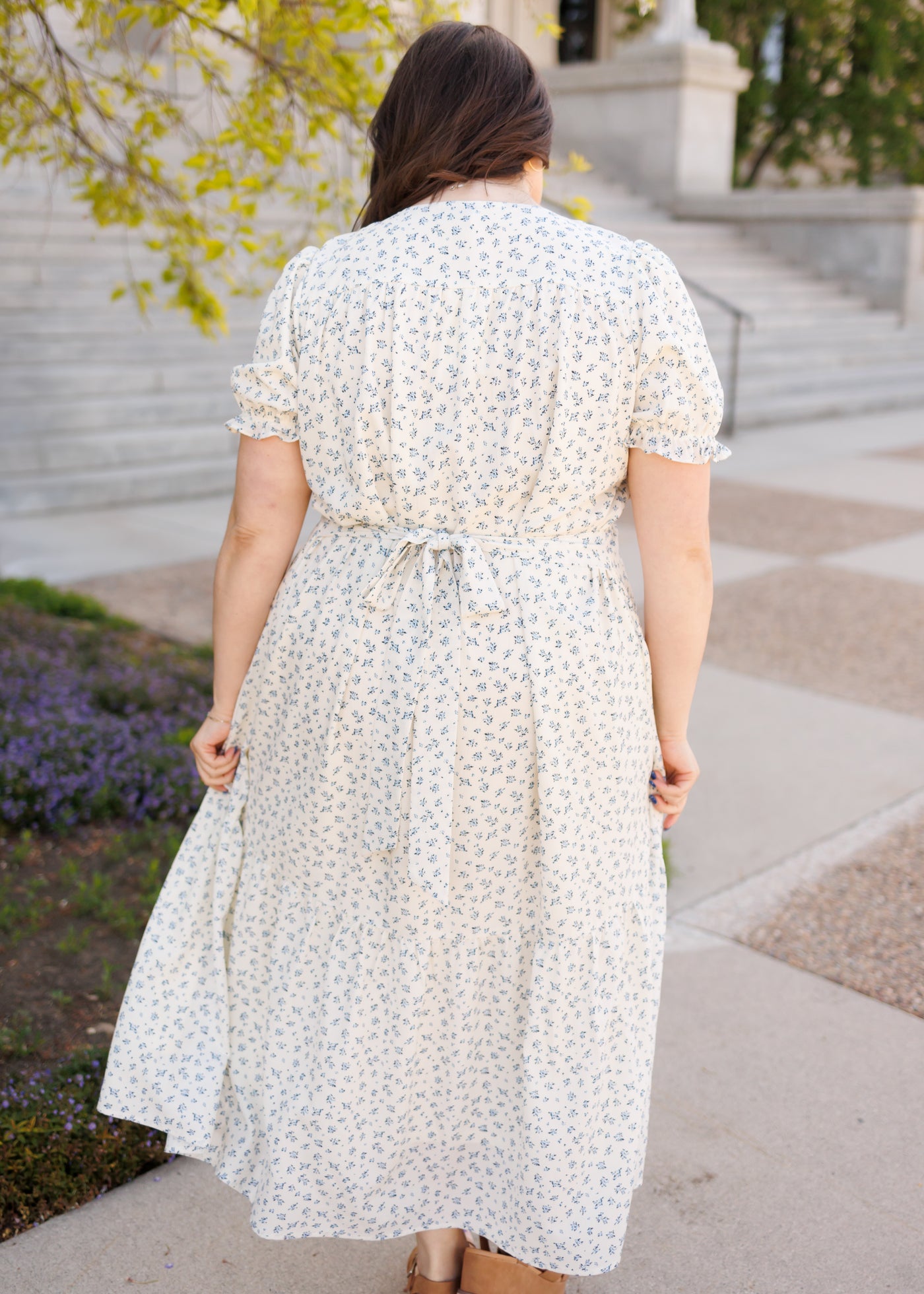 Back view of the blue floral smocked dress in plus size
