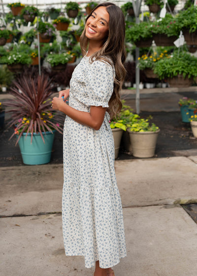 Side view of the blue flroal smocked dress