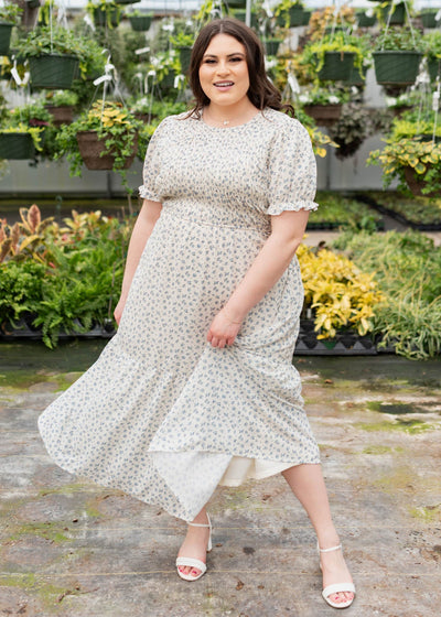 Blue floral smocked dress with short sleeves in plus size