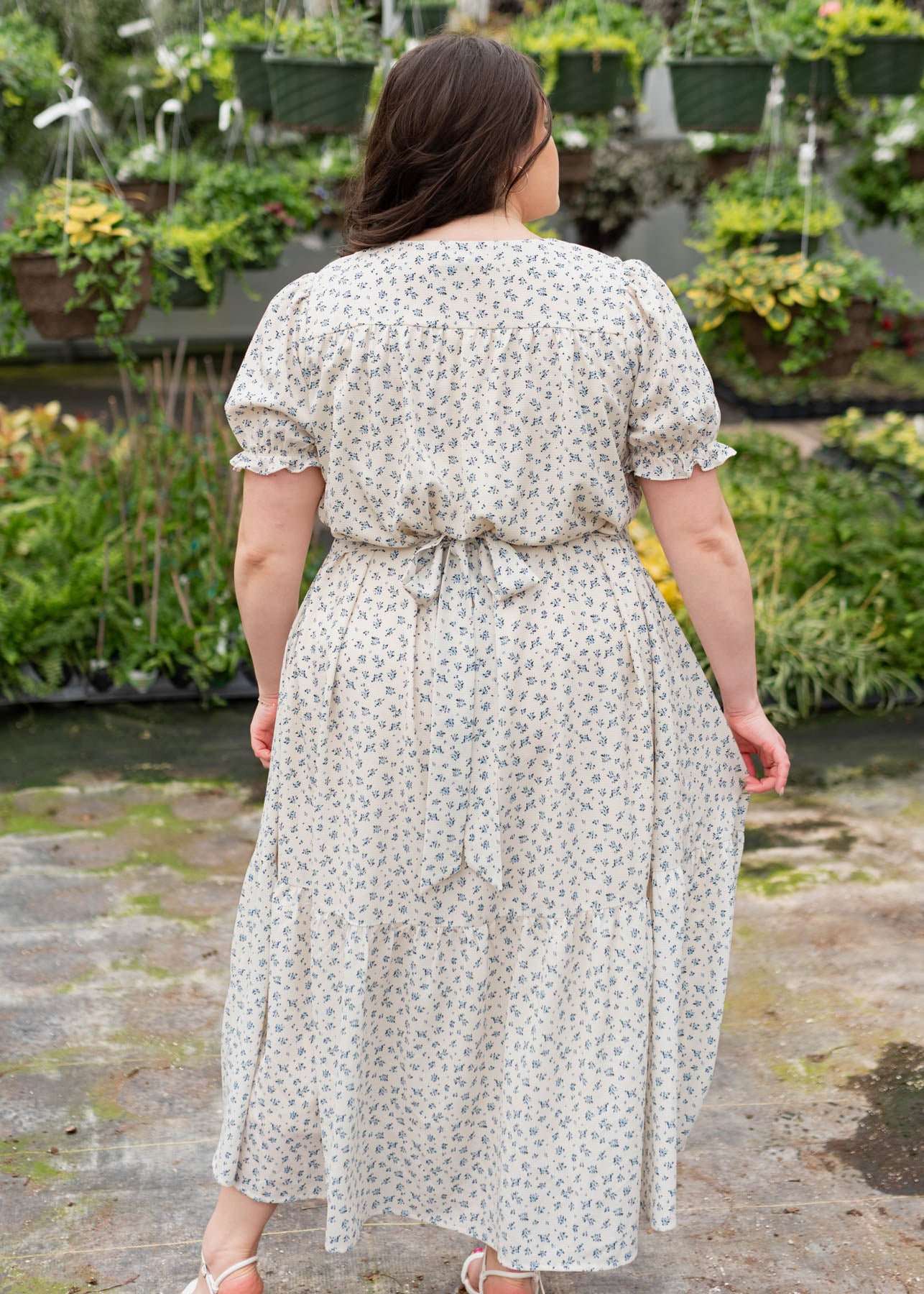 Back view of the blue floral smocked dress in plus size