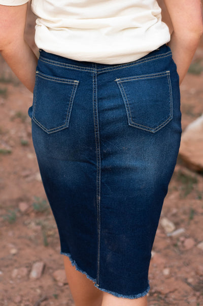 Back view of a dark indigo skirt