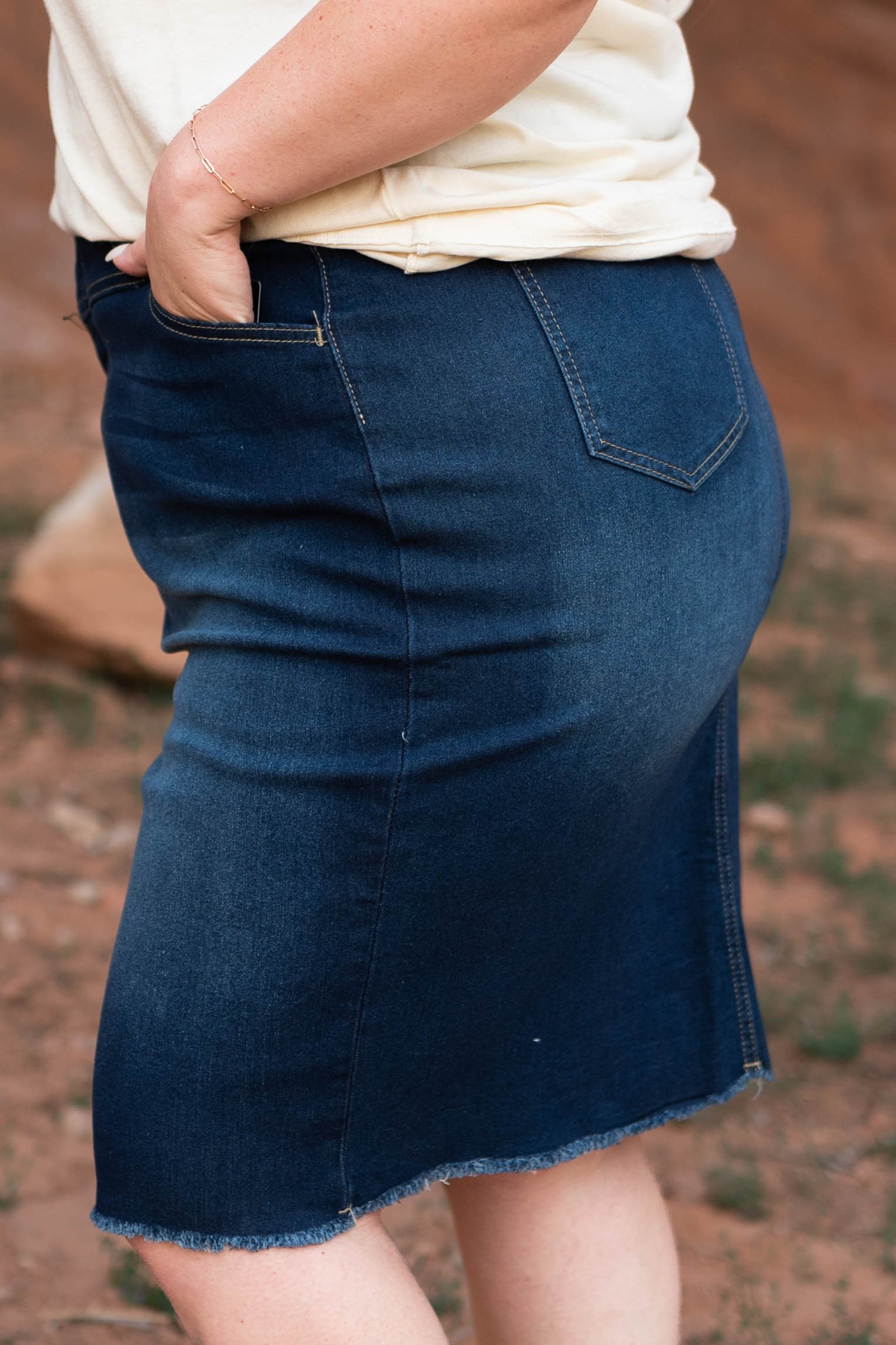 Side view of a plus size indigo skirt
