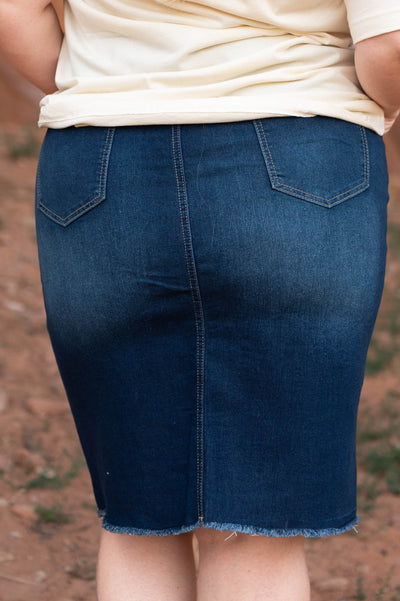 Back view of a plus size dark indigo skirt