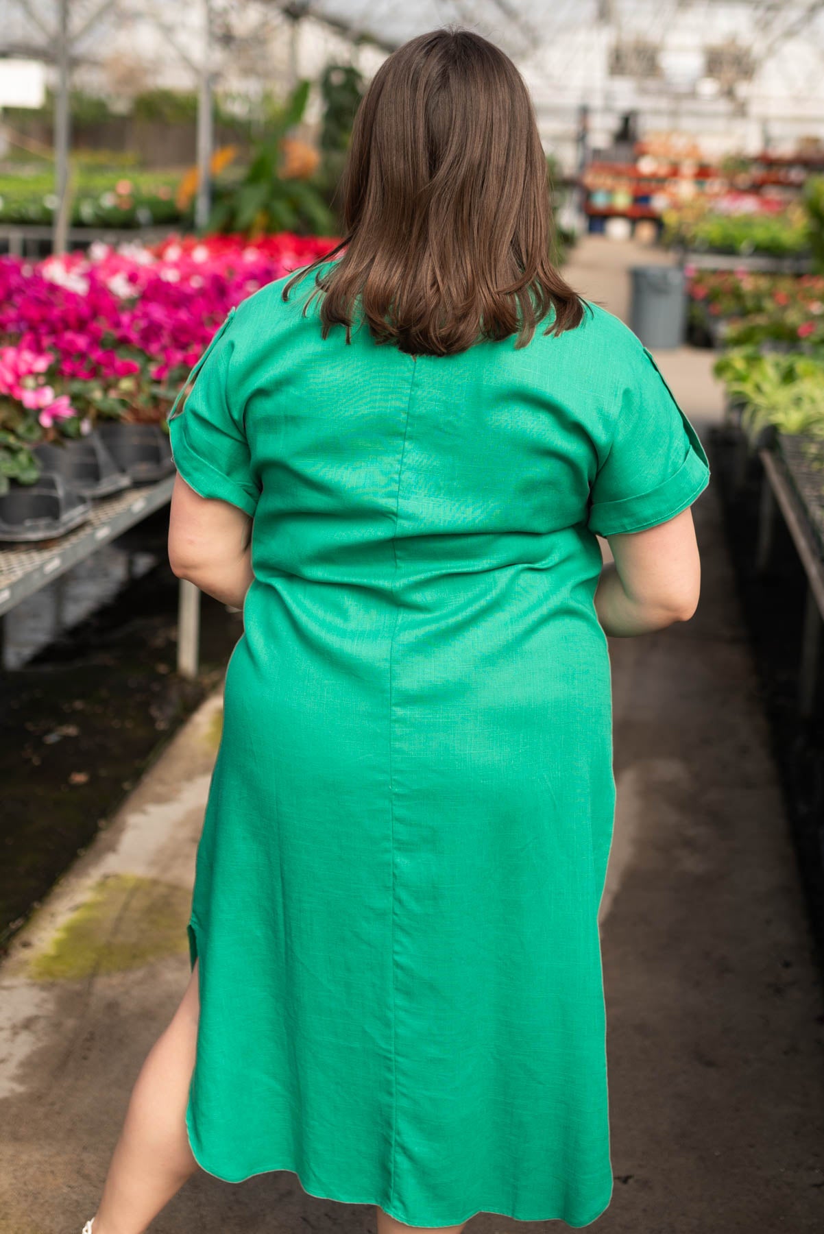 Back view of the plus size green button down dress