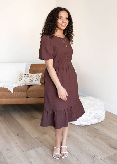 Bown textured dress with wide elastic waist