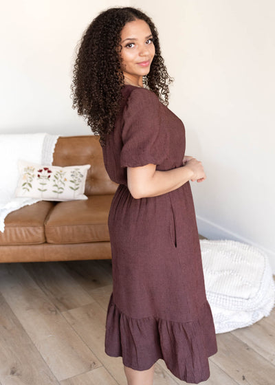 Side view of the brown textured dress