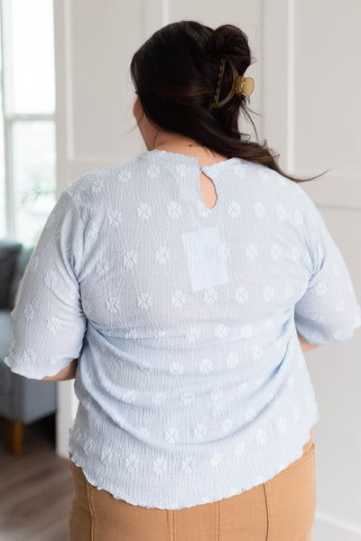 Back view of the plus size dusty blue top