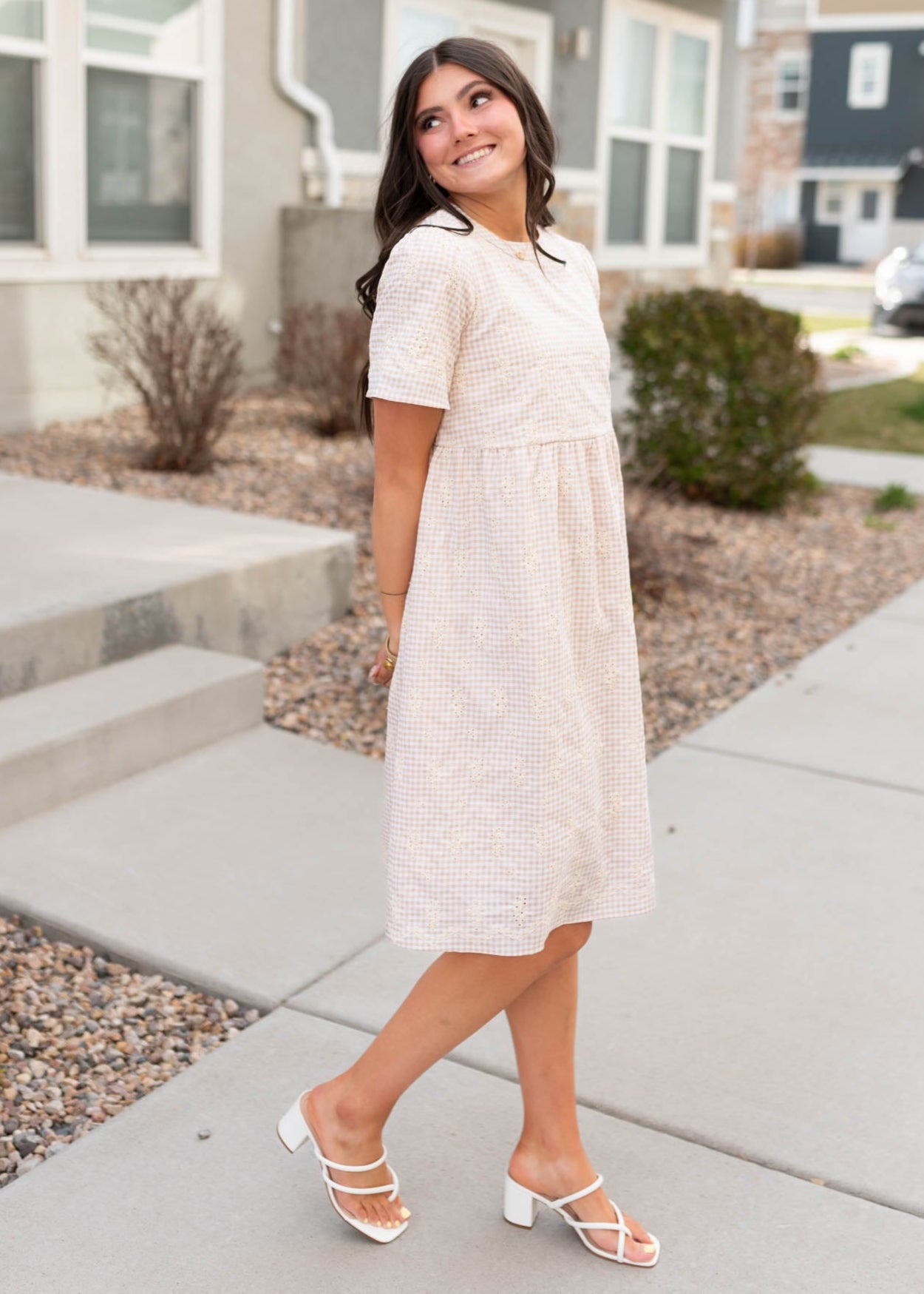 Side view of the embroideredgingham mini dress with short sleeves