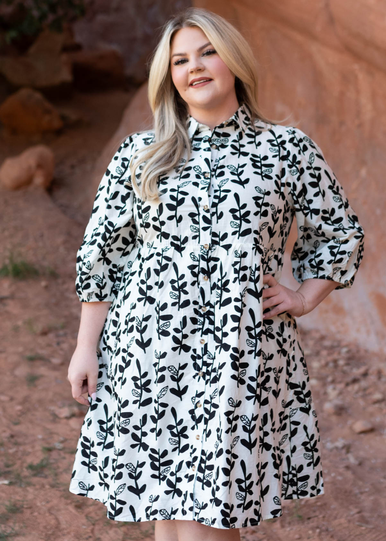 Plus size black floral dress with a collar
