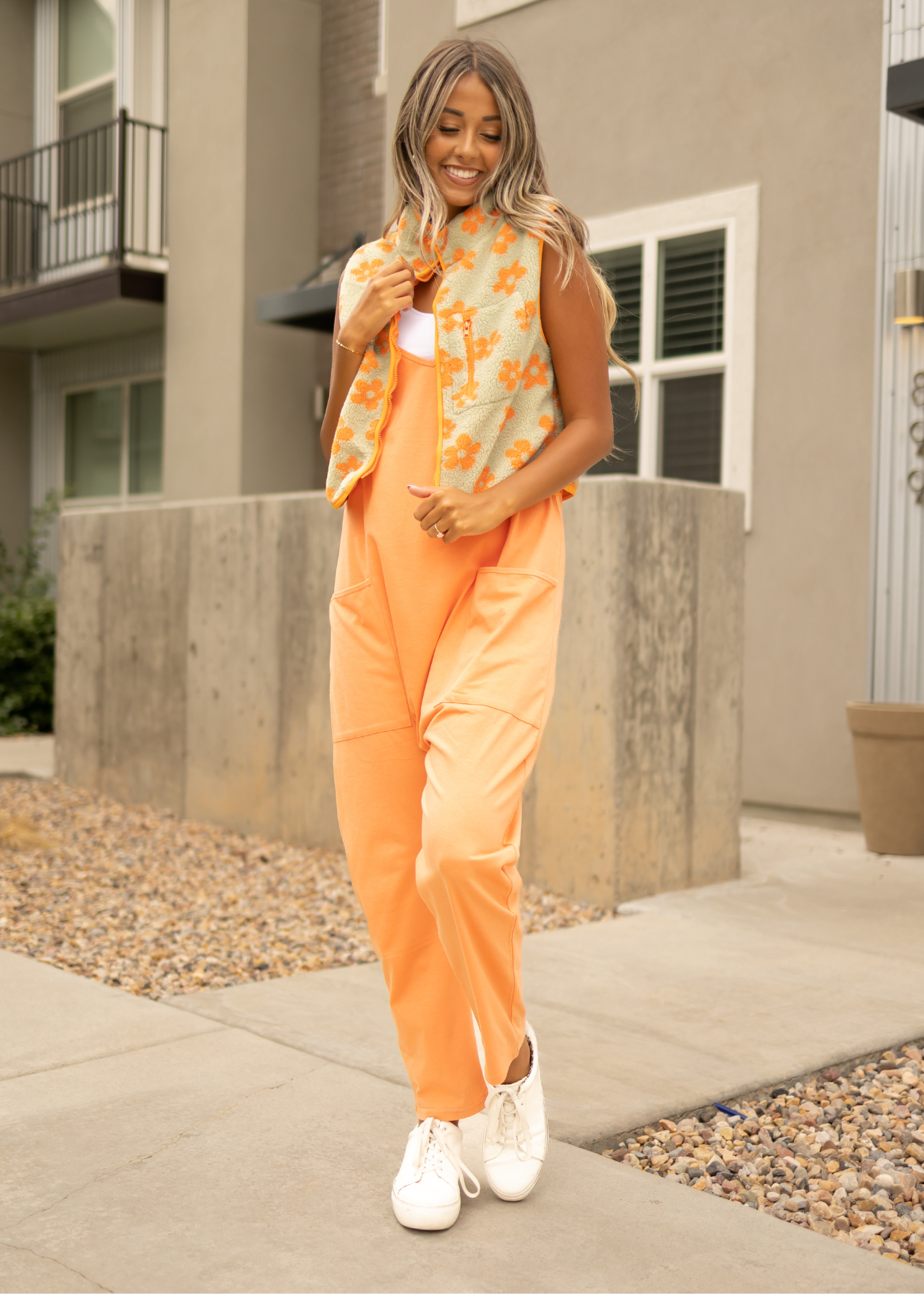Orange fleece vest with front zipper pocket