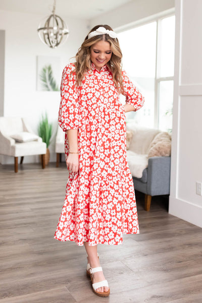 Red floral dress with 3/4 sleeves and a collar